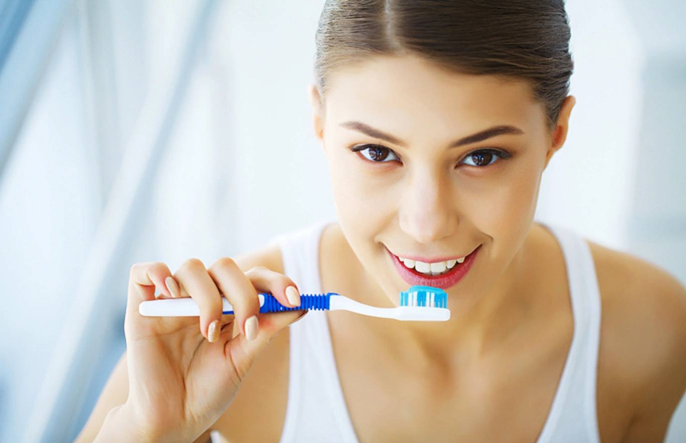 Can I brush my teeth after wisdom teeth removal?